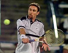 Felix Mantilla of Spain returns a shot to top seed Pete Sampras at the Newsweek Champions Cup on Wednesday in Indian Wells