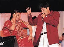 A belle from Gujarat strikes a pose as Jasbir Jassi belts out his number "Dil lai gayee" at Cyanide '99 at Panjab University in Chandigarh on Friday
