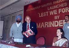 Field Marshal SHJF Manekshaw releasing the book by PPCC President, Mr Amarinder Singh as Chief guest Sonia Gandhi looks on