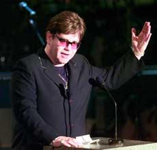 Elton John addresses the audience while he posthumously inducts Dusty Springfield during the 14th Annual Rock and Roll Hall of Fame induction ceremony in New York on Monday. Springfield was inducted into the Rock and Roll Hall of Fame Monday night in the "performer" category
