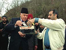 Jammu and Kashmir Chief Minister Dr.Farooq Abdullah with noted Film producer Boney Kapoor inaugurates the "Mahurat" shot of a Hindi feature film, Pukaar, on the foot hills of Shankaracharya overlooking world famous Dal Lake in Srinagar on Wednesday