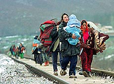 Refugees from villages surrounding Glogovac flee towards the city, which is some 35 kms. 