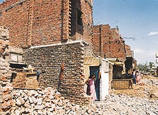 Parts of houses which have been pulled down by residents of the Ram Darbar colony in the Industrial Area, Chandigarh, to facilitate widening of a road.