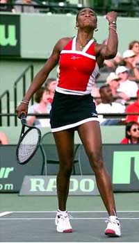 Venus Williams of Palm Beach Gardens celebrates a point late in the match against Jana Novotna of Czech Republic at the Tennis Center during the Lipton Championship