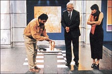 Dr Ghosh (centre) in Eureka... Answers galore.