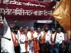 Activists of "Hindu Sikh Parv Committee" staging a 'nagar kirtan' to celebrate the 300th anniversary of Khalsa Panth in New Delhi on Tuesday
