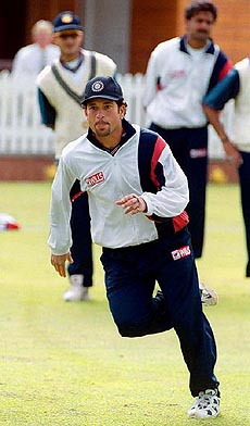 India's star batsman Sachin Tendulkar exercises before the start of his team's practice match aginst Loughborough University at Oakham