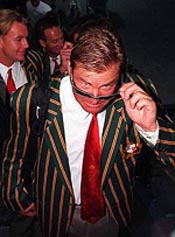 Australian cricketer Shane Warne arrives at Gatwick airport south of London, with the rest of the Australian team as preparations start for the Cricket World Cup, Sunday