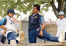 Indian bowler Srinath, goes through some exercises with Ajay Jadeja (right) and Ajit Agarkar
