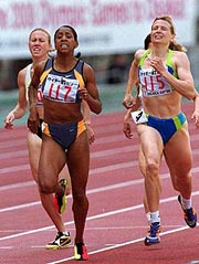 Britain's Diane Modahl  crosses the finish line to win the women's 800-meter race 