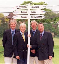 Former England cricketers who are to commentate on the Cricket World Cup (from left) Bob Willis, David Gower, Paul Allott and Ian Botham, stand below the Cricket World Cup sign in Southampton 