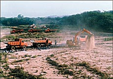 Mechanical desilting in progress