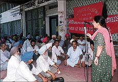 Members of the Land Mortgage Bank Employess Union hold a rally in support of their demands in sector 17, Chandigarh, on Tuesday. 