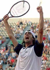 Fernando Meligeni of Brazil reacts after he defeated third-seeded Patrick Rafter