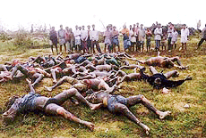 Piles of bodies of cyclone victims lying in heaps near Paradip in Orissa on Thursday