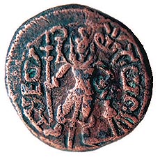 The Brahmi script of the 3rd century depicted on a Yaudheya coin. In the centre is seen Kartikeya, son of Lord Shiva.