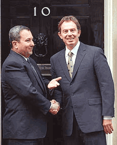 Britain's Prime Minister, Tony Blair, greets his Israeli counterpart, Ehud Barak