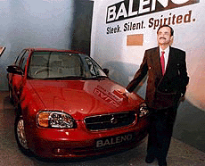 Managing Director of Maruti Udyog Limited Jagdish Khattar with Baleno after its launching in New Delhi on Monday
