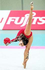 Alina Kabaeva of Russia, 16, performs with a ball during preliminaries of the World Rhythmic Gymnastics Championships at a gymnasium in Osaka, western Japan, on Wednesday