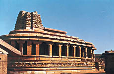 Apsidal Durga temple (6th century), with a developing shikara and Buddhist colonnaded ambulatory