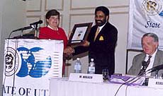 Ms Olene Walker, Lt. Governor of the State of Utah (USA) presents a letter of appointment to Mr Kewal Dhillon as the first trade counsellor of Utah to India in New Delhi on Friday