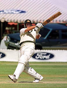 Australian batsman Mark Waugh in action on the second day of the first test against Zimbabwe at the Harare Sports Club on Friday
