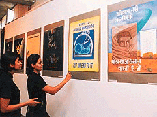 Visitors go around an exhibition of posters at the Government Museum and Art Gallery, Sector 10, Chandigarh, on Thursday. 