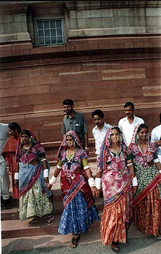 Tribals from Andhra Pradesh arriving at Parliament House to witness the preceddings of their first session of the 13th Lok Sabha, in New Delhi 