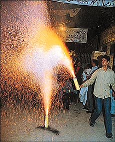 Anti-Sharif people of Lahore city celebrate his dismissal with fireworks.