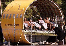   POMONA, USA : An FAA official assesses results after conducting a drop test to evaluate the structural integrity of a 500-gallon conformable auxiliary fuel tank in a cross-section of a jetliner fuselage, Thursday, at the William J. Hughes Technical Center in Pomona, N.J. 