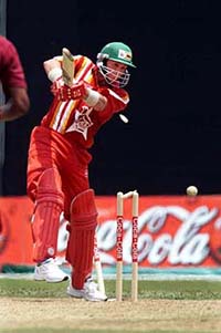 Zimbabwe's Andy Flower ends his campaign for a century at 89 as fast bowler Mervyn Dillon of the West Indies gets his wicket during the opening game of the three-nation Coca Cola Singapore Challange one-day cricket tournament in Singapore on Thursday