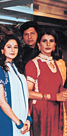 Anita (in red suit) in Aashiqui ... Back in the arc lights