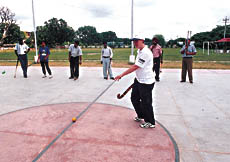 Sports teachers of various schools of the city watching Nadine Richards give a practical demonstration of minky or mini hockey at SD Public School, Sector 32, in Chandigarh, on Monday.