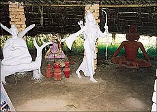 Winsome statues of Lord Rama, Sita, Mahavira and Buddha — Photo by Jasmail Singh