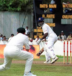 Sri Lankan batsman Sanath Jayasuriya (right) looks back after playing the stroke that cost his wicket during the first day of the second test against Australia in Galle International Cricket ground in Galle, Sri Lanka, on Wednesday