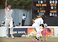 Australian bowler Glen McGrath celebrates the dismissal of Sri Lankan batsman Rumesh Kaluwitharene during the second day of the second cricket test against Sri Lanka 