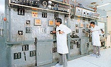 Hot cells for handling of high intensity cobalt-60 sources for 