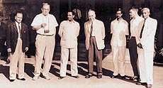 Dr. Neils Bohr flanked by Dr. Home Bhabha on his right and Dr. Raja Ramanna on his left in front of Apsara reactor building. Mr A.S. Rao is on extreme right.