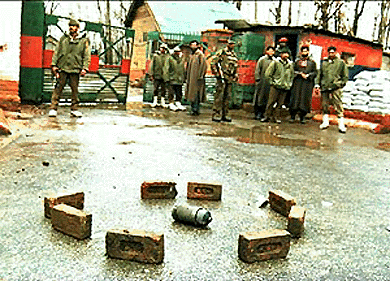 An unexploded indigenous explosive device (IED) lying outside the main gate of the Rashtriya Rifle headquarters after a militant attack in Anantnag on Thursday — PTI photo