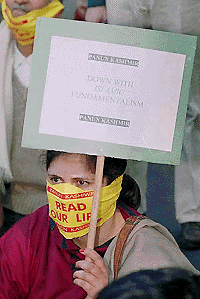Kashmiri Pandits, members of Panun Kashmir, demonstrating near the Parliament House in New Delhi on Wednesday. — PTI 