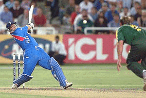 England's Darren Gough tries in vain to score 4 runs off the last ball bowled by South Africa's Jacques Kallis, right, during the 2nd one-day International at the Newlands Cricket ground, Cape Town South Africa on Wednesday. South Africa won the match by 1 run