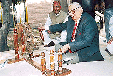 On the occasion of the martyrdom day of Mahatma Gandhi, the UT Administrator, Lieut-Gen J.F.R. Jacob (retd), tries his hand at a charkha in Chandigarh on Sunday.      — Tribune photo by Karam Singh