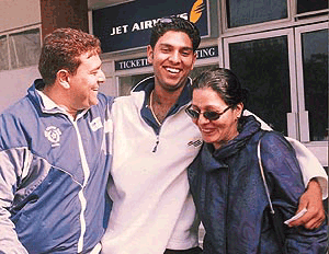 An elated Yuvraj Singh hugs his parents on reaching the airport after playing in the just-concluded U-19 World Cup in Sri Lanka, in Chandigarh on Monday