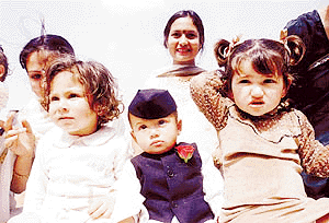 While the parents had a tough time with the organisers, tiny-tots strike a pose, all ready to participate in the Mega Baby Show — 2000 at Spring Fest. — Tribune photo by Pankaj Sharma.