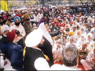 Mrs Rajinder Kaur Bhattal, a former Chief Minister of Punjab, addresses members of the Anandgarh Hatao Joint Action Committee in Sector 17 of Chandigarh on Tuesday. Also seen in the picture are Mr Ravi Inder Singh, MLA, and Mr Jagmohan Singh Kang, a former minister