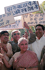 Delhi Chief Minister Sheila Dikshit with members of the Congress Legislature Party at a protest march over the increase in prices of kerosene and LPG, at Gandhi Smriti in New Delhi on Friday. — PTI photo
