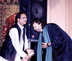 Ghazal maestro Ghulam Ali is greeted by Punjabi singer Hansraj Hans at the “Punjab Hungama” organised by the Rotary Club, Chanakyapuri, in New Delhi on Friday night