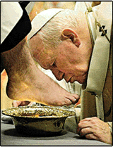 Pope John Paul II kisses the foot of an unidentified clergyman during the Holy Thursday Mass in St Peter’s Basilica at the Vatican on Thursday. The rite evokes Jesus washing of the apostles’ feet the day before his crucifixion, and is maintained by the Church as a symbol of humility