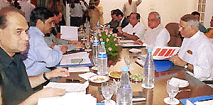 Prime Minister Atal Behari Vajpayee and Finance Minister Yashwant Sinha at a meeting with industrialists, in New Delhi on Saturday. — Photo by Sondeep Shankar