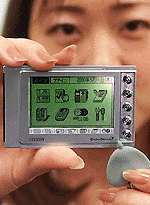 Citizens unveils the world’s smallest and lightest PDA gadget DataSlim 2 in Tokyo on Thursday. — AFP